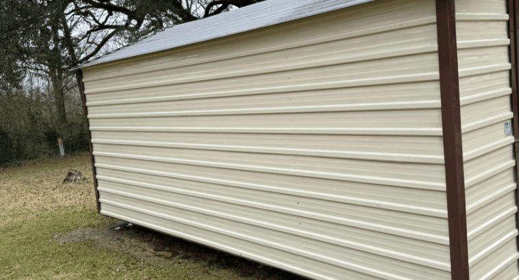 Spotless cream shed side panel after pressure washing